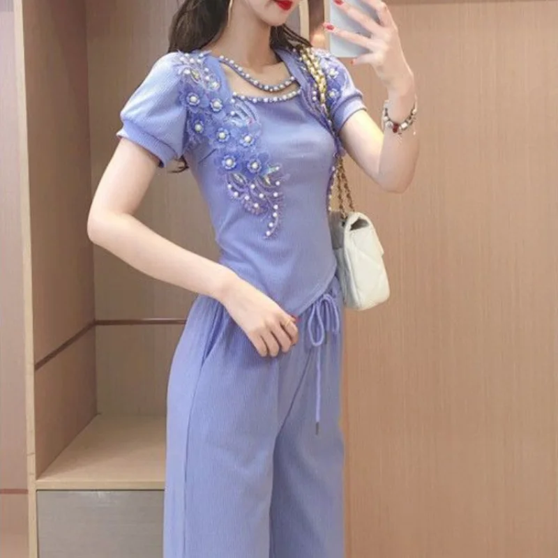 Szerokie spodnie damskie fiole – Summer Clothing Trends 2025 recenzja i cena